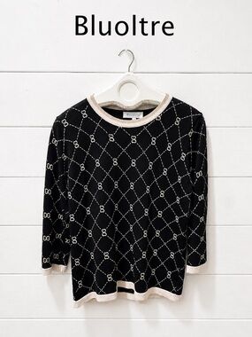 Elegant knit top by Bluoltre, size M/L. Black